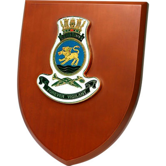 An Exceptional HMAS Cerberus Plaque is now available for order. This exquisite plaque showcases a stunning 100mm full colour enamel crest, elegantly placed on a 200x160mm timber finish shield. www.defenceqstore.com.au