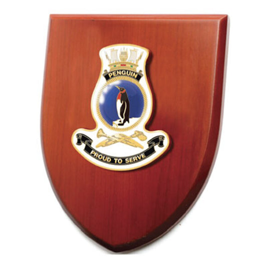 The Exceptional HMAS Penguin Plaque is a truly remarkable piece that is sure to impress. This exquisite plaque showcases a stunning 100mm full colour enamel crest, elegantly set on a 200x160mm timber finish shield.  www.defenceqstore.com.au