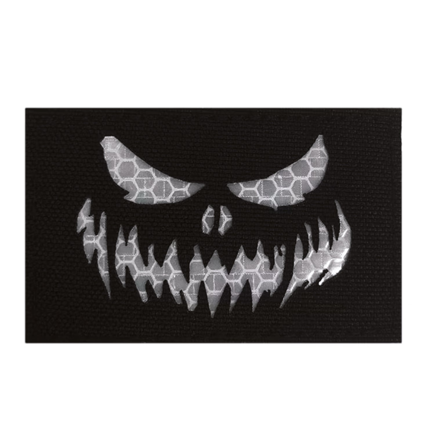 Stand out in low-light conditions with this striking Haunting Laser Cut Reflective Patch Hook &amp; Loop. Precision laser-cut design delivers crisp, detailed edges that catch the eye, while the reflective feature ensures visibility when it matters most.  www.defenceqstore.com.au