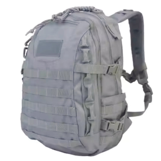 The City Tactical 40LT Backpack in Gray is equipped with MOLLE webbing on the front and sides, a small front pouch, full-length middle and back compartments featuring multiple pockets, and Velcro-sealed drink pockets on the sides for secure storage when not in use. www.defenceqstore.com.au