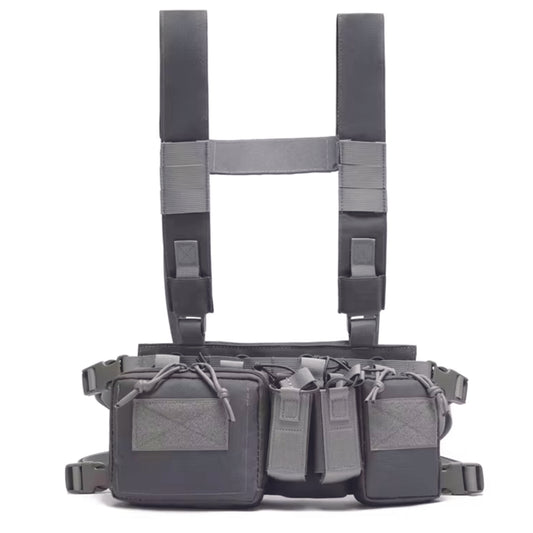 The Stealth OPS Gear Chest Rig Harness in Gray is crafted from durable 500D Nylon, offering strength without the bulk. Its lightweight and compact design ensures maximum mobility and speed with minimal drag. Equipped with four large magazine pouches, two smaller ones, and two front pouches, it’s perfect for airsoft, military drills, and cadet training. Stay agile and prepared with this reliable chest rig. www.defenceqstore.com.au