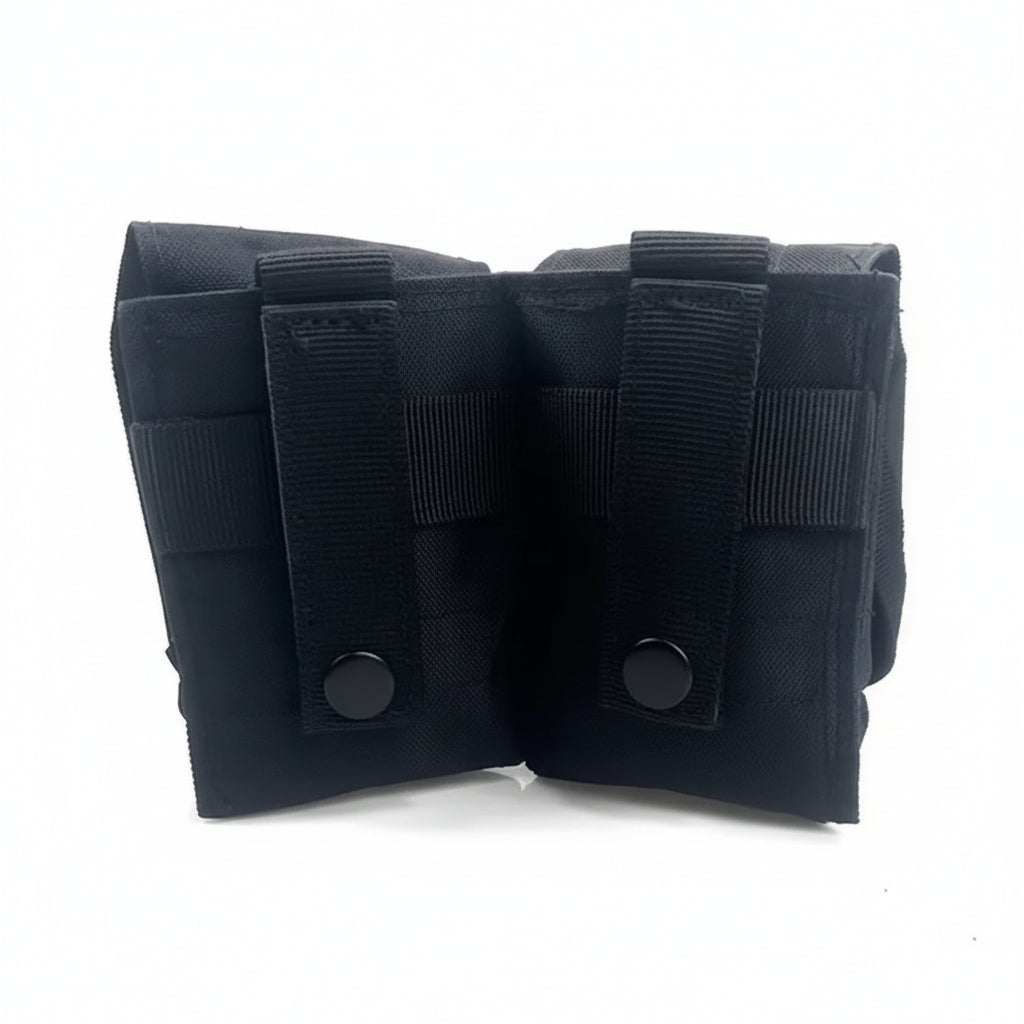 Engineered for tactical efficiency, this Double Frag Grenade Pouch secures F1 grenades and comparable equipment with reliable precision. Constructed from hardwearing 500D nylon with an integrated rear panel and MOLLE webbing, it delivers durability where it counts. www.defenceqstore.com.au