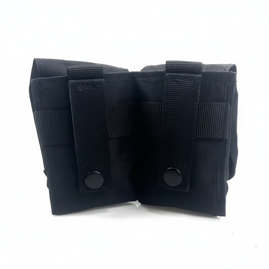 Engineered for tactical efficiency, this Double Frag Grenade Pouch secures F1 grenades and comparable equipment with reliable precision. Constructed from hardwearing 500D nylon with an integrated rear panel and MOLLE webbing, it delivers durability where it counts. www.defenceqstore.com.au