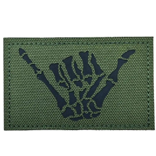 Make a bold statement with the Cool Hand Laser Cut Green Patch. This striking 8x5cm patch features laser-cut precision detailing that demands attention. Backed with both hook and loop fasteners, it's ready to attach to tactical gear, backpacks, or uniforms instantly. www.defenceqstore.com.au