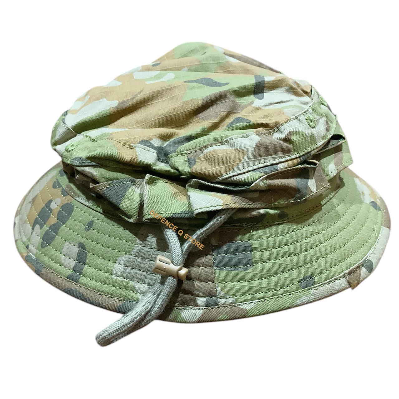 Elevate your outdoor adventures with the Premium Quality AMCU Giggle Bush Hat. Made with breathable fabric and two sturdy drawstrings, this hat is designed for ultimate comfort and functionality. www.defenceqstore.com.au