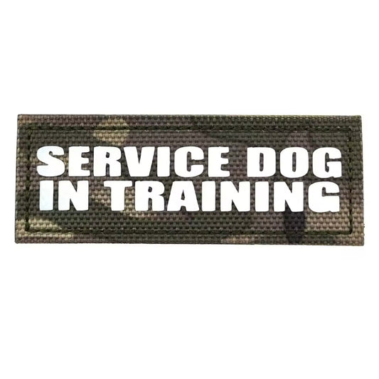 Enhance your dog's training with this Service Dog In Training Laser Cut Multicam Patch! Measuring 8x3cm and equipped with a hook and loop backing, this patch is an essential addition to your gear. Don't hesitate to display your unwavering commitment to excellence! www.defenceqstore.com.au