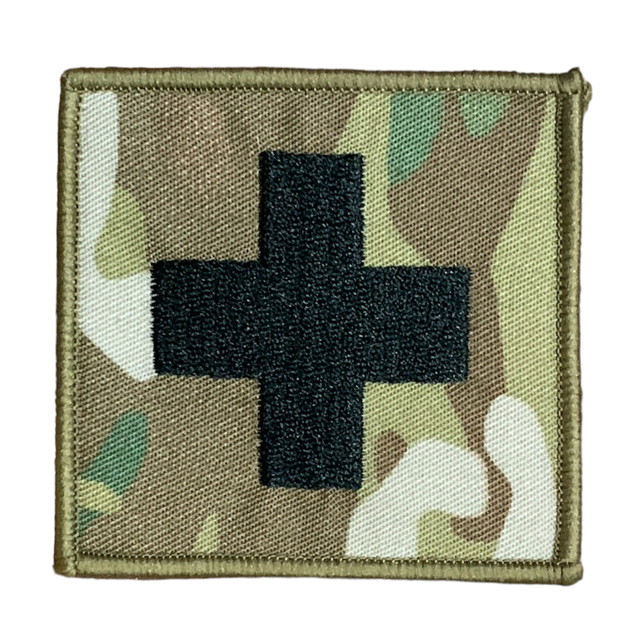 This Military Combat Patch, with the option of Plain or Velcro backing, is an essential for First Aid personnel in the field. Made from high-quality materials, this patch features an Australian-made field medical symbol and can easily be attached to First Aid Kits, Packs, or arm bands. Its exceptional quality is evident with overlocked edges and a size of 65mm x 65mm. Plus, it's proudly made in Australia using Multicam Fabric. www.defenceqstore.com.au