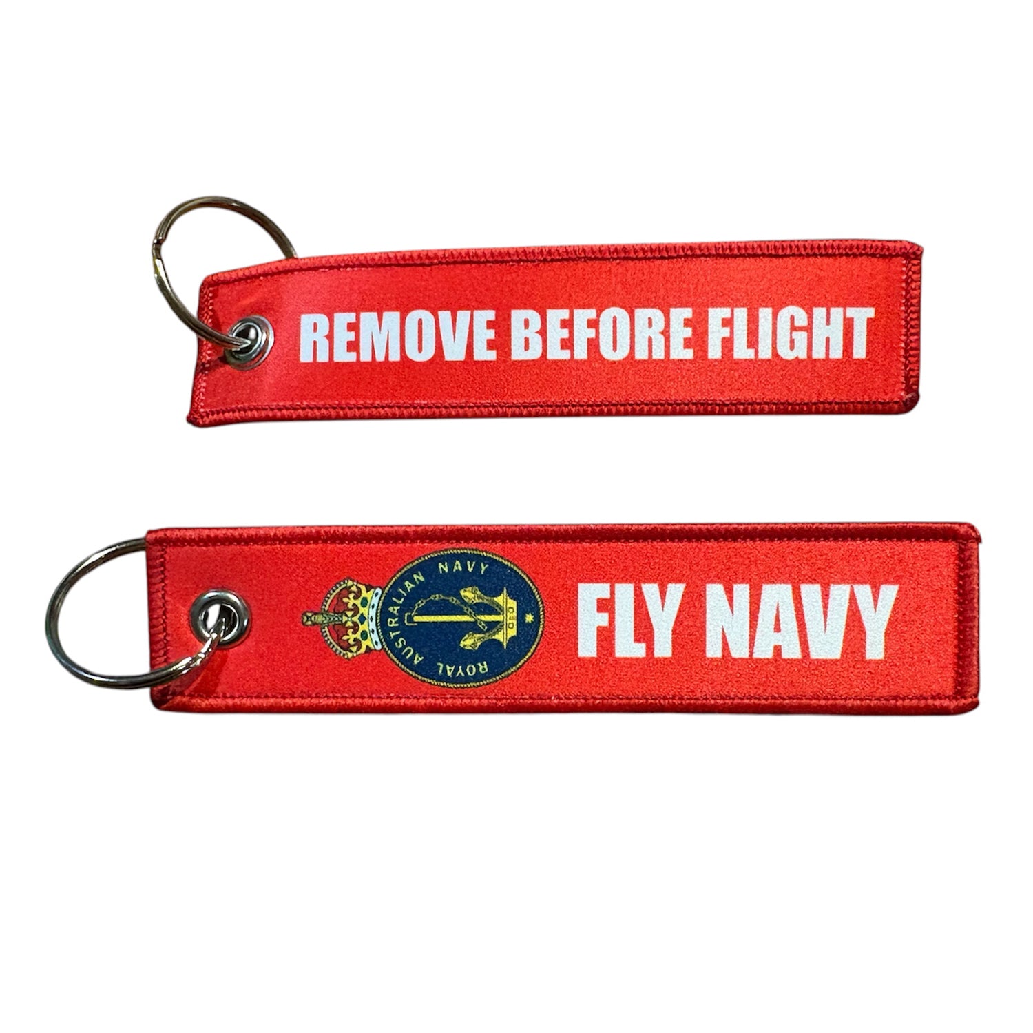 Keep your keys secure and add a touch of military pride with this authentic Navy Key Tag. Featuring bold embroidered Navy insignia and the iconic "Remove Before Flight" wording, it's a practical accessory that makes a statement. www.defenceqstore.com.au