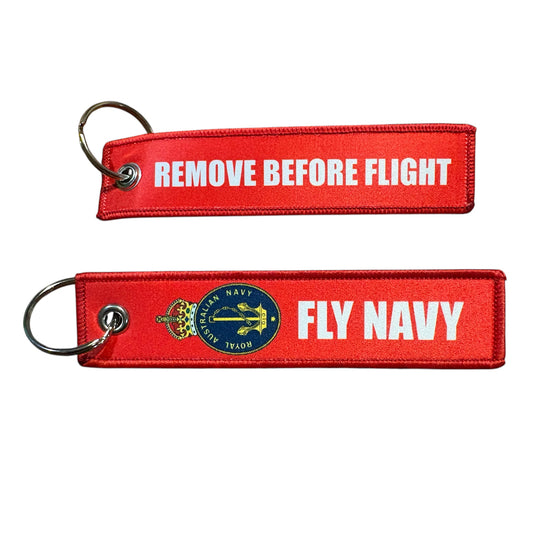 Keep your keys secure and add a touch of military pride with this authentic Navy Key Tag. Featuring bold embroidered Navy insignia and the iconic "Remove Before Flight" wording, it's a practical accessory that makes a statement. www.defenceqstore.com.au