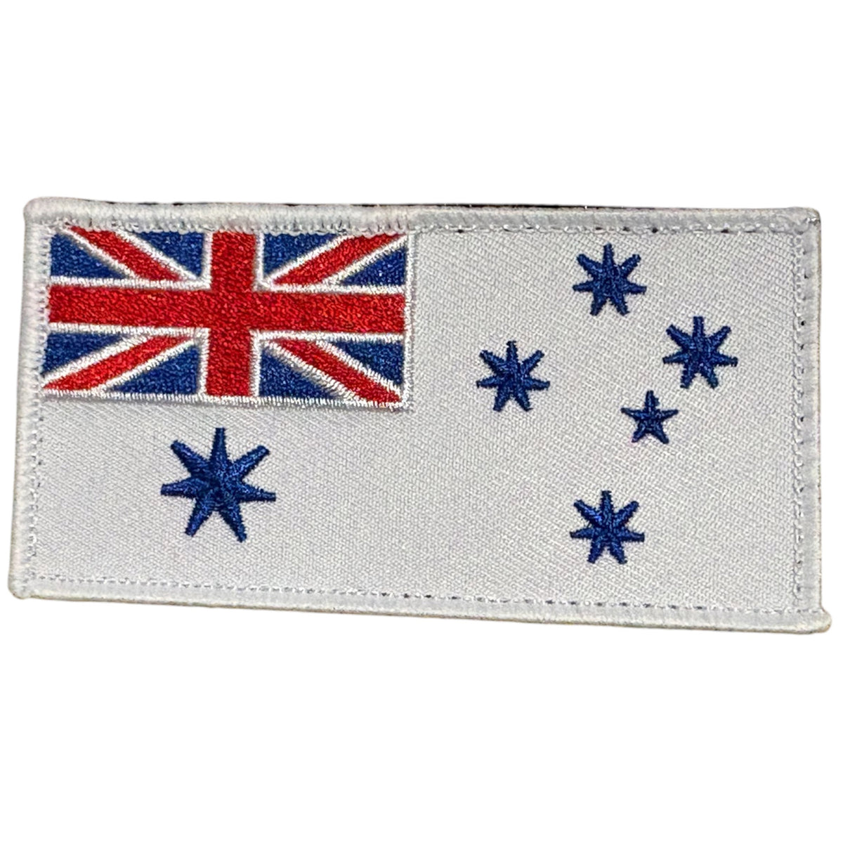Honour Australia's naval heritage with this striking Navy White Ensign patch. A powerful symbol of maritime tradition and national pride, this embroidered morale patch brings authentic military spirit to your collection, gear, or uniform. www.defenceqstore.com.au