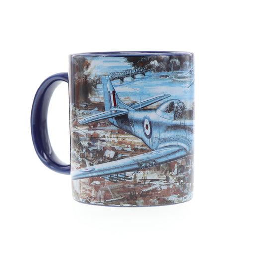 With only 1000 mugs available worldwide, it is a rare find. The mug showcases Drew Harrison's masterpiece, "Cutting the Lines," along with a schematic of the aircraft in the base. Made from durable ceramic with an easy-grip handle and scratch-resistant finish, this mug is perfect for enjoying both hot and cold beverages. www.defenceqstore.com.au