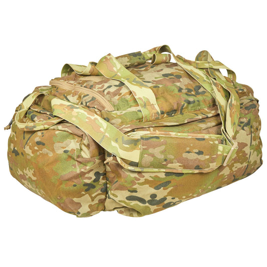 The DE Bag V2 is manufactured from rugged, water-resistant 1000D nylon Cordura material. For added strength, the 50mm webbing that forms the shoulder strap and carry handles runs the full length and width of the bag. The main compartment features a D shaped zipper opening for ease of accessing and storing gear. www.defenceqstore.com.au