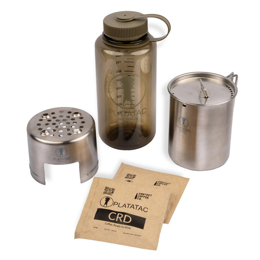 A compact, no-nonsense system for hot drinks, hydration, and sustainment in the field.

1 x Platatac Stainless Steel Field Cup

1 x Field Cup Cooker

1 x 1 Litre Rapid Fill Water Bottle

2 x sachets of Contact Coffee Co. coffee 
www.defenceqstore.com.au