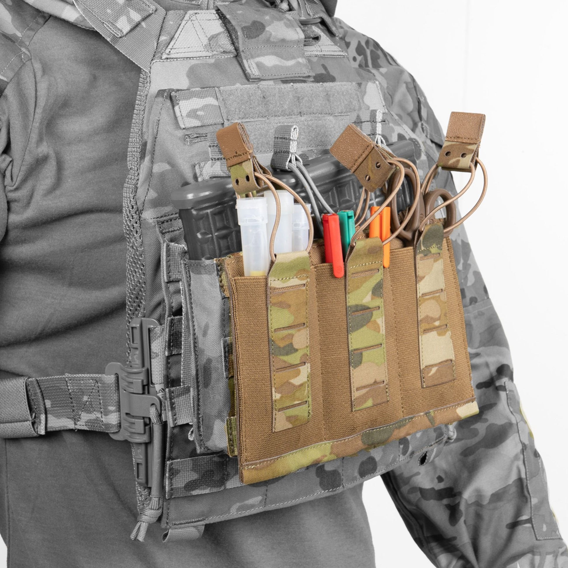 This is an admin pouch for essentials that you need immediate access to. This pouch is to be added to the issue TBAS triple shingle mag carrying pouch. Easy, fast access to (we suggest) lighter weight objects is the best use of this pouch. www.defenceqstore.com.au