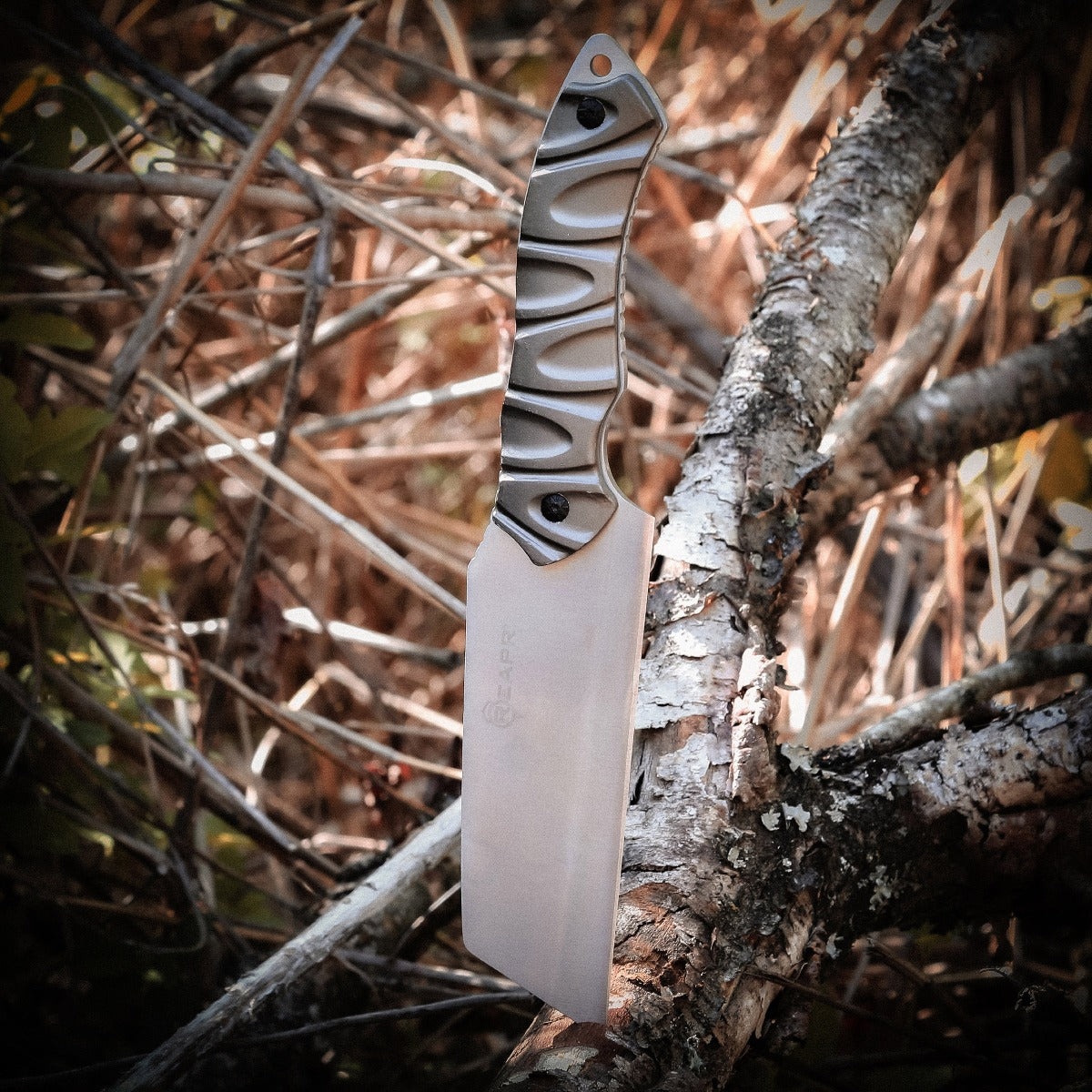 The Reapr JAMR Knife is the ultimate in versatile, tactical fixed-blade knives. The JAMR features an industry first modified cleaver blade, combining the functions of a cleaver, drop point knife and reverse tanto blade to meet a variety of demands, whether as a hunting knife, camping knife, and for guiding, tactical and survival use. www.defenceqstore.com.au