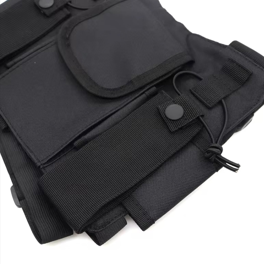 The Radio Vest Black is an essential gear piece for professionals who rely on seamless communication. Trusted by police, military, security teams, and hospital staff, this durable vest is designed to keep your radios secure and accessible. It features dedicated compartments to carry two radios simultaneously, ensuring you stay connected at all times. www.defenceqstore.com.au