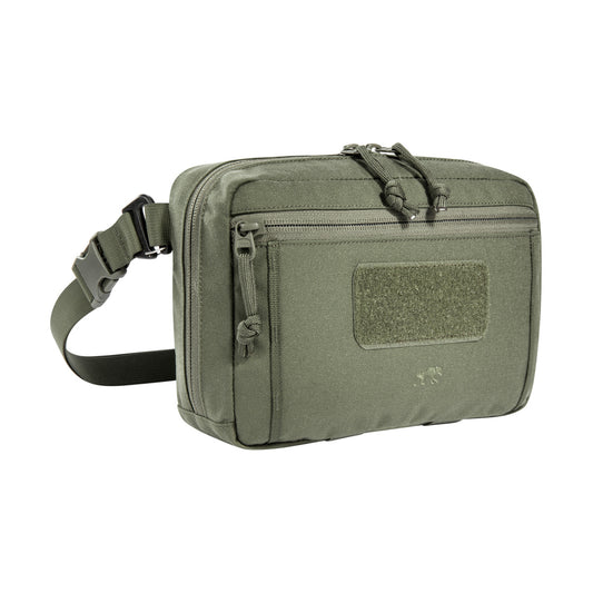 The bag has a removable MOLLE reverse system for attachment to plate carriers and backpacks. In addition, it can be hooked with loops to the TT Survival Pack or other MOLLE surfaces with appropriate buckles. There is also a pass-through for a 50mm belt loop. Inside are flat mesh pockets, elastic loops and a large MOLLE hook-and-loop surface. www.defenceqstore.com.au