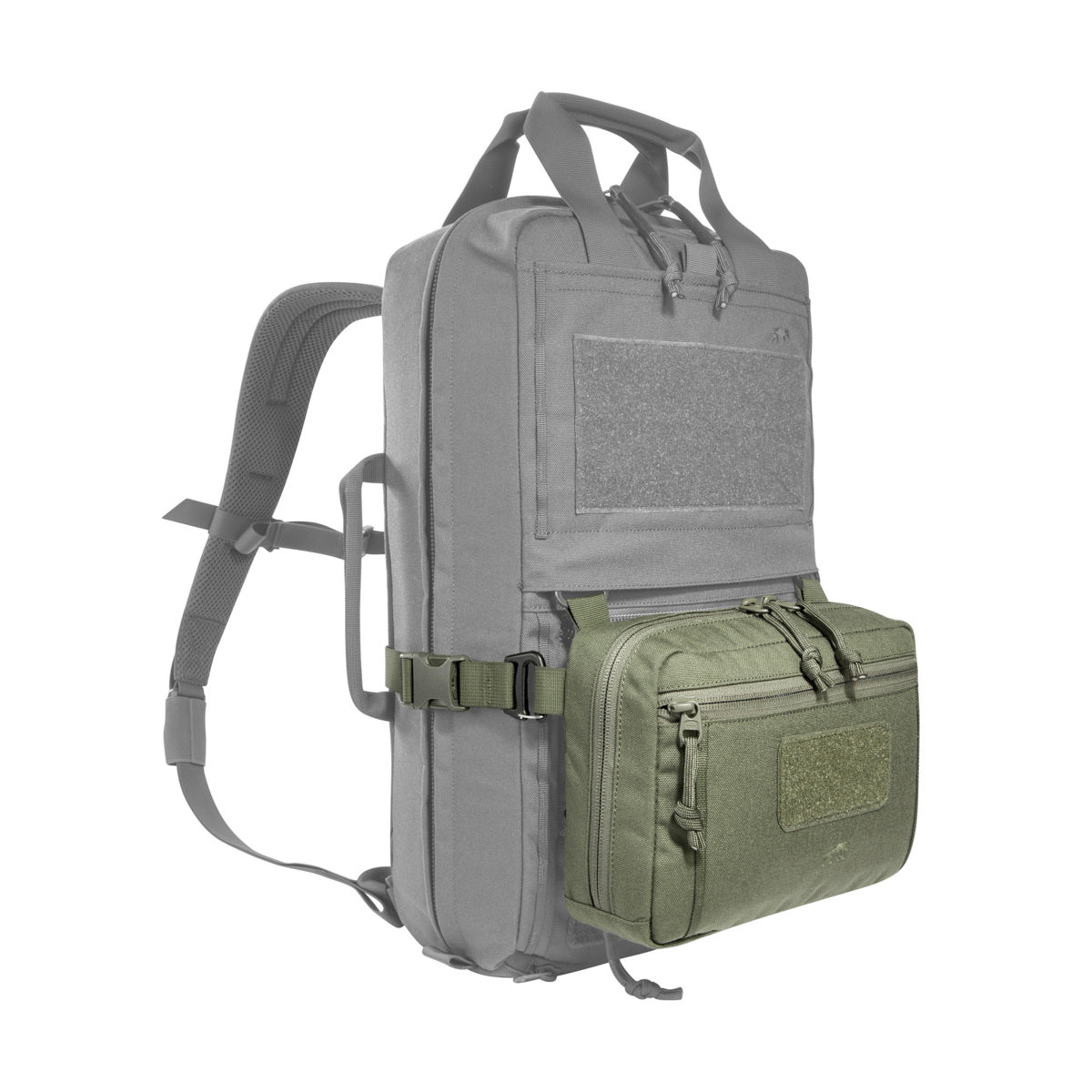 The bag has a removable MOLLE reverse system for attachment to plate carriers and backpacks. In addition, it can be hooked with loops to the TT Survival Pack or other MOLLE surfaces with appropriate buckles. There is also a pass-through for a 50mm belt loop. Inside are flat mesh pockets, elastic loops and a large MOLLE hook-and-loop surface. www.defenceqstore.com.au