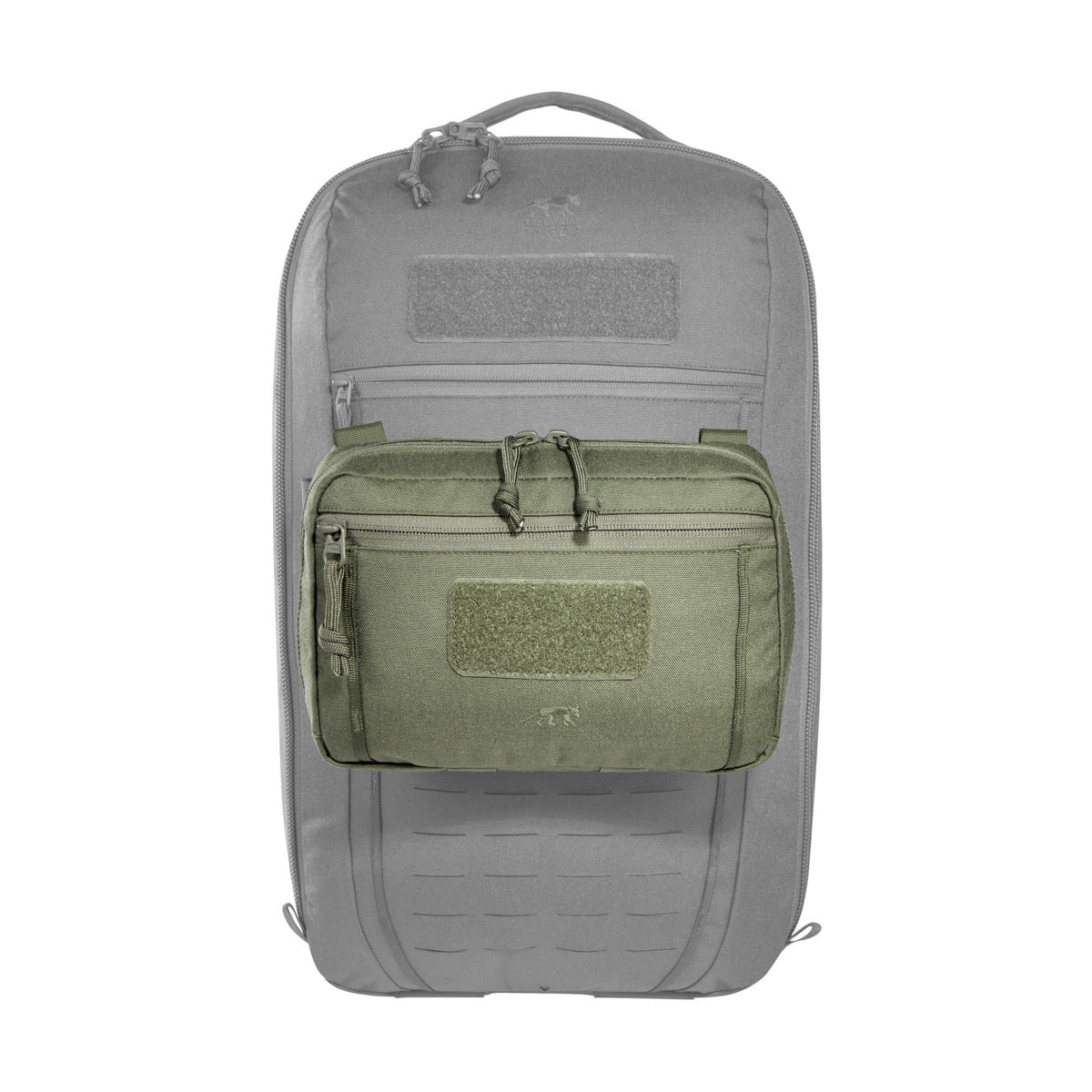 The bag has a removable MOLLE reverse system for attachment to plate carriers and backpacks. In addition, it can be hooked with loops to the TT Survival Pack or other MOLLE surfaces with appropriate buckles. There is also a pass-through for a 50mm belt loop. Inside are flat mesh pockets, elastic loops and a large MOLLE hook-and-loop surface. www.defenceqstore.com.au