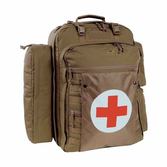 Generously fitted-out first aid backpack. The side pockets are detachable, while the padded interior compartment has adjustable compartments. The backpack also has a removable panel with detachable, labelled clear pockets, MOLLE system and elastic loops. www.defenceqstore.com.au