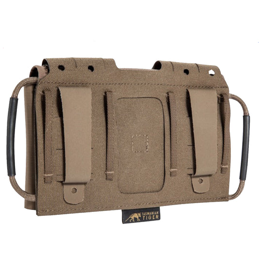 Small, flat IFAK pouch for mounting on MOLLE surfaces or on the belt. The fold-out first aid panel, which can be individually equipped, can be pulled out on both sides. www.defenceqstore.com.au