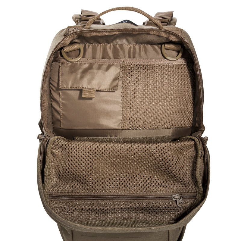 Small 22 litre universal combat backpack with two attachable pockets and elastic side pockets. It has a MOLLE hook-and-loop in the main compartment for customised modular add-ons and the laser-cut MOLLE on the front and sides mean you can combine it with other gear. www.defenceqstore.com.au