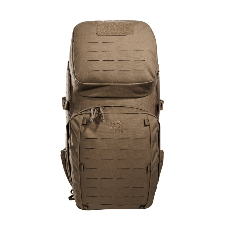 Small 22 litre universal combat backpack with two attachable pockets and elastic side pockets. It has a MOLLE hook-and-loop in the main compartment for customised modular add-ons and the laser-cut MOLLE on the front and sides mean you can combine it with other gear. www.defenceqstore.com.au