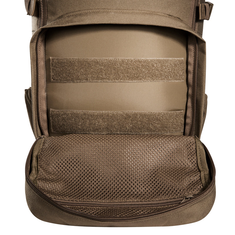 Small 22 litre universal combat backpack with two attachable pockets and elastic side pockets. It has a MOLLE hook-and-loop in the main compartment for customised modular add-ons and the laser-cut MOLLE on the front and sides mean you can combine it with other gear. www.defenceqstore.com.au