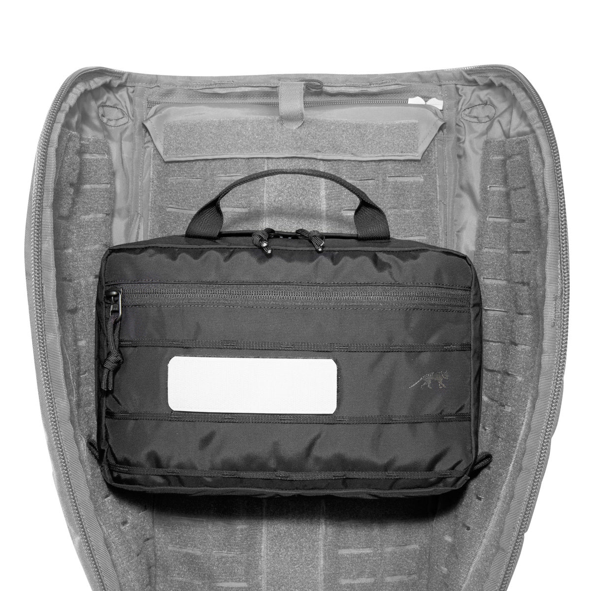 The TT Multipurpose Pouch VL can be attached to modular backpacks using the large, coverable hook-and-loop areas on the outside. On the inside it features mesh pockets, loops and an organizer. www.defenceqstore.com.au