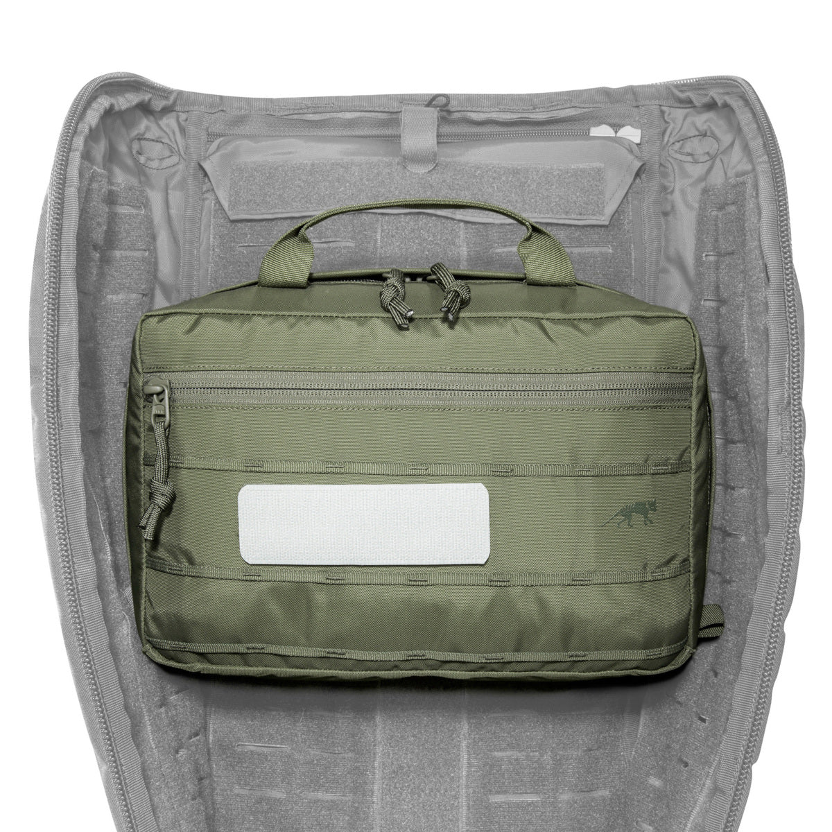 Sturdy equipment bag with 6 liter volume and handle. Attachable to modular backpacks. With mesh pockets, loops and an organizer inside. www.defenceqstore.com.au