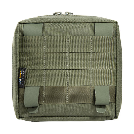 Experience ultimate organization and convenience with the Tasmanian Tiger TAC 5.1 Accessory Pouch in Black. Boasting 15 x 15 x 6 cm dimensions, a spacious opening, and the innovative MOLLE reverse system and hook-and-loop interior, this accessory pouch is the perfect addition to your tactical gear arsenal. Stay prepared and ready for anything with this must-have accessory pouch. www.defenceqstore.com.au