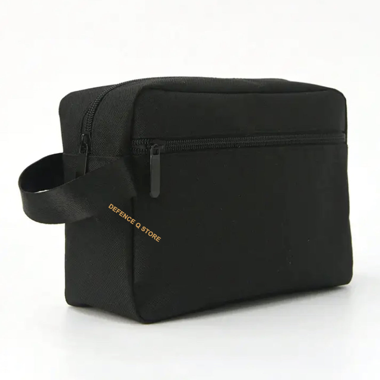 This Toiletry Bag Black is a must-have for any traveler. With dimensions of 16.5cm (H) x 23cm (W) x 9cm (D), it's perfect for storing toiletries and accessories. Made from 100% Polyester, it boasts a sleek and durable design. The side carry handle, front pocket compartment with closeable zip, and top zip closure make it a convenient and stylish choice. www.defenceqstore.com.au