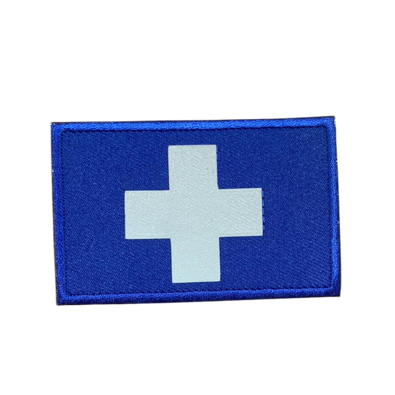 This Medic Reflective Laser Cut Patch is an essential addition to any gear collection! The durable hook and loop backing ensures easy attachment to any surface. Measuring at 8x5cm, this patch is the perfect size for visibility and practicality. Both the hook and loop pieces are provided, making application a breeze. Don't miss out on the value and versatility of this patch! www.defenceqstore.com.au