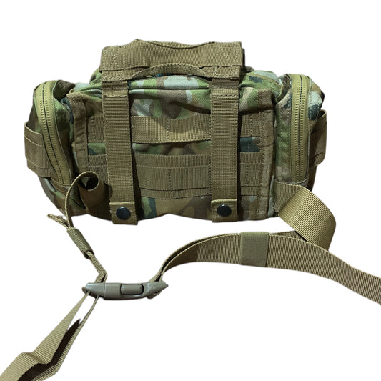 Elevate your outdoor adventures with the AMCU Waist Bag With MOLLE Adaptability! This versatile bum bag features convenient side and front pockets, as well as MOLLE fittings and x2 straps for ultimate functionality. The top compression strap/handle and waist belt ensure a secure fit, while the main compartment with mesh divider allows for easy organization. Crafted with heavy duty fabric, this bag can handle even the toughest terrain.  www.defenceqstore.com.au