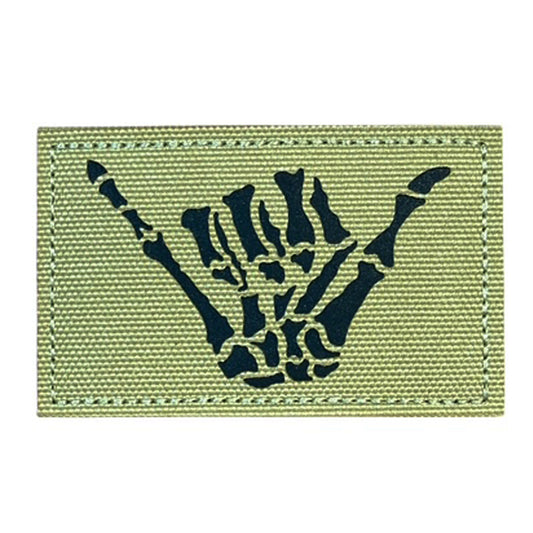 Make a bold statement with the Cool Hand Laser Cut Tan Patch. This striking 8x5cm patch features laser-cut precision detailing that demands attention. Backed with both hook and loop fasteners, it's ready to attach to tactical gear, backpacks, or uniforms instantly. www.defenceqstore.com.au