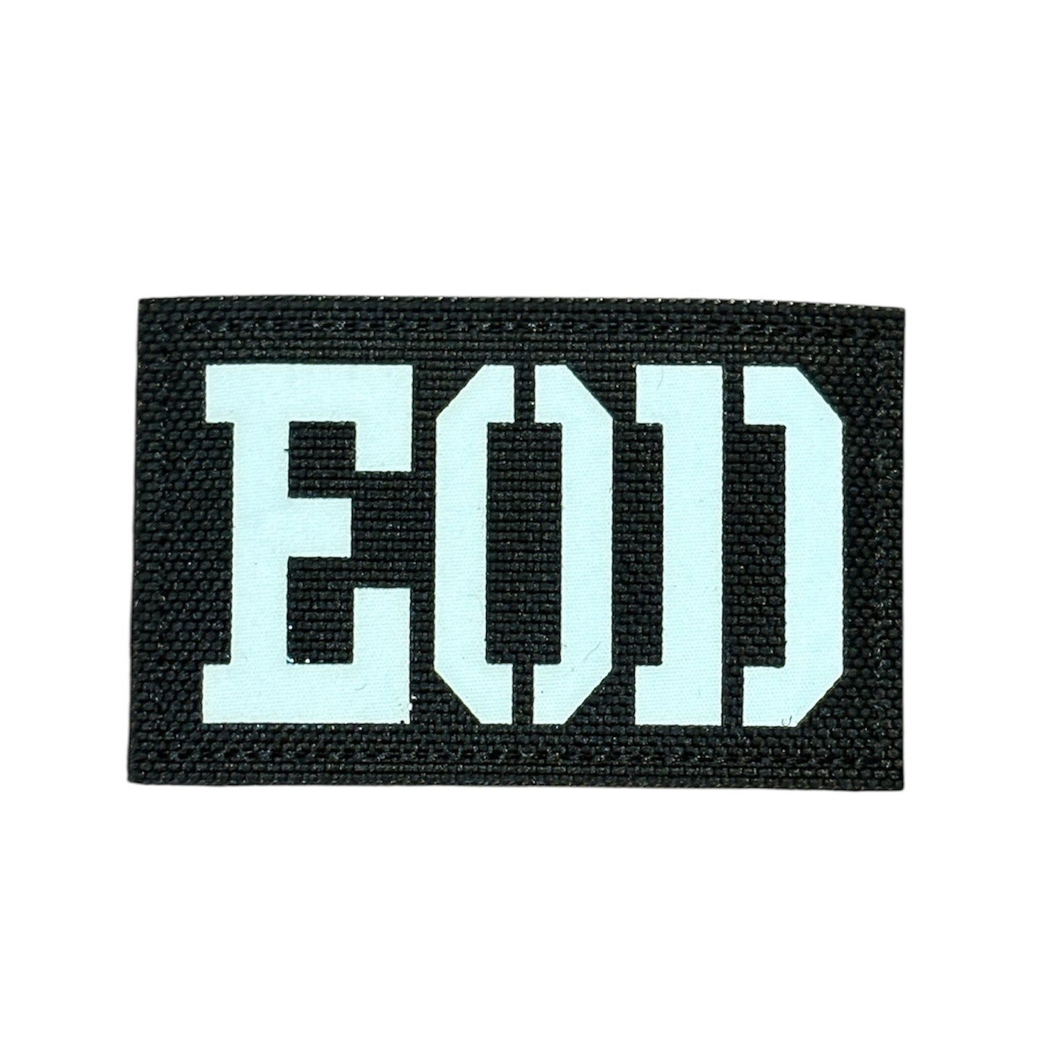 Make a bold statement with the EOD Laser Cut Black Patch. This striking 8x5cm patch features laser-cut precision detailing that demands attention. Backed with both hook and loop fasteners, it's ready to attach to tactical gear, backpacks, or uniforms instantly. www.defenceqstore.com.au