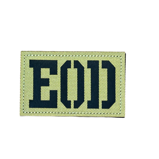 Make a bold statement with the EOD Laser Cut Tan Patch. This striking 8x5cm patch features laser-cut precision detailing that demands attention. Backed with both hook and loop fasteners, it's ready to attach to tactical gear, backpacks, or uniforms instantly. www.defenceqstore.com.au