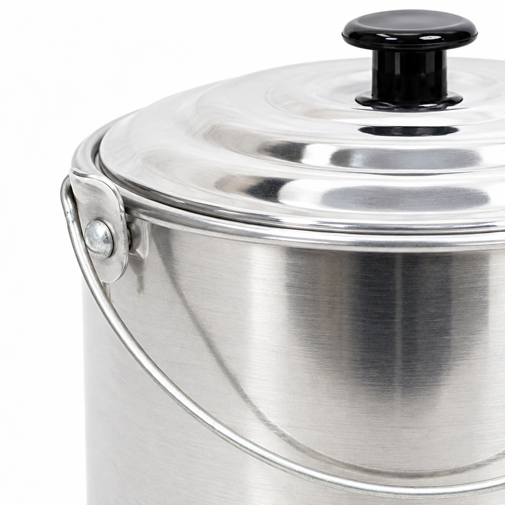 Close-up of aluminium billy lid and wire bail handle detail