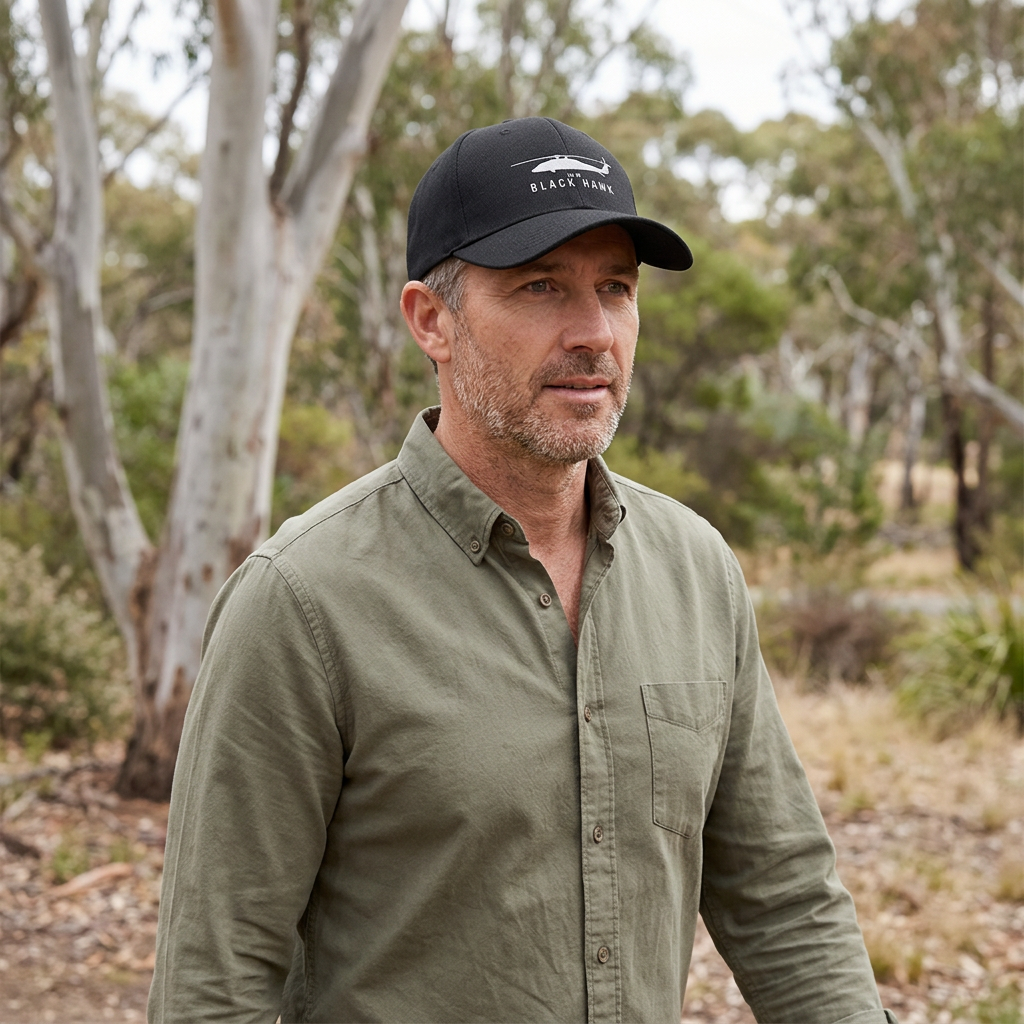 Illustrative Black Hawk UH-60 black cap worn on a walk in eucalyptus bushland