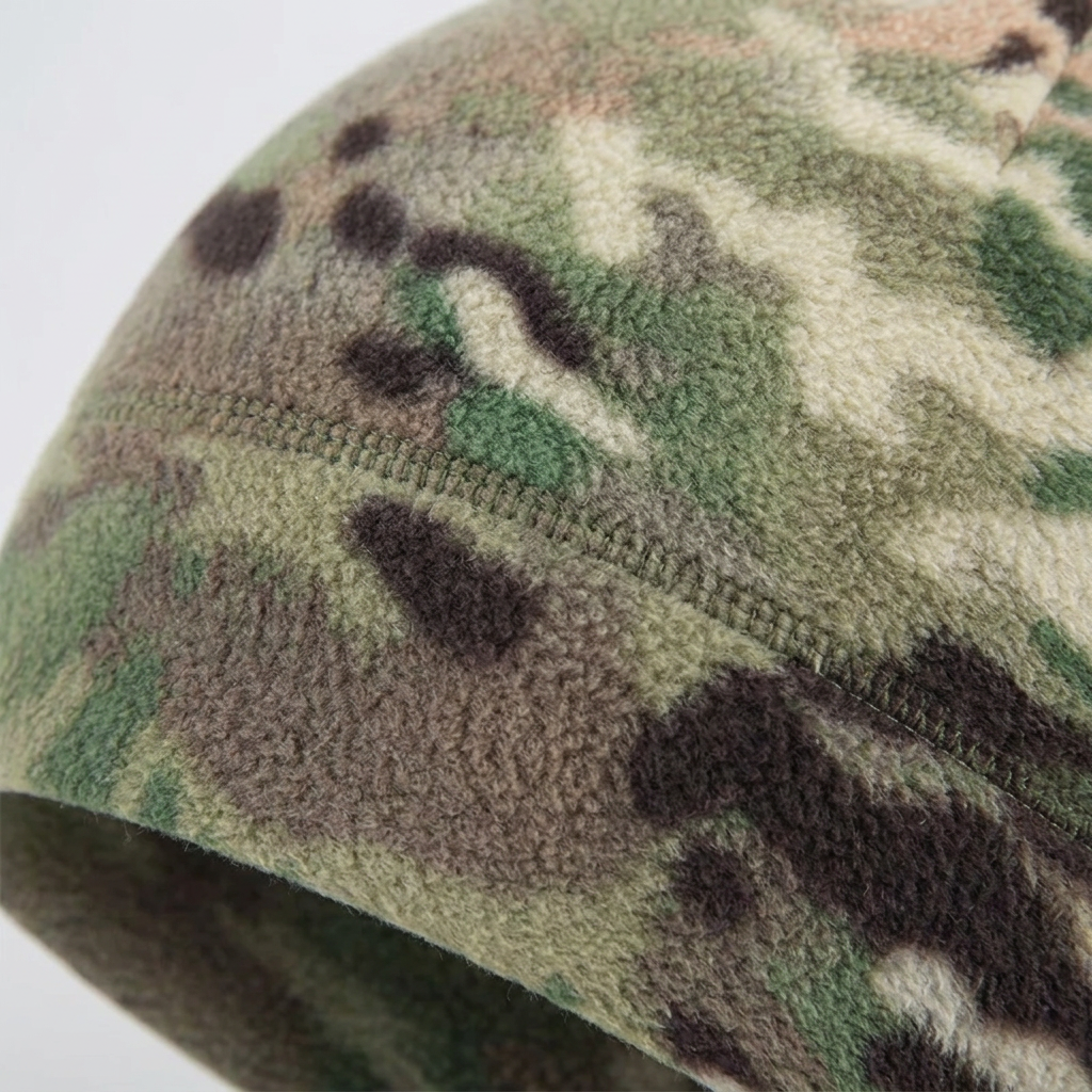 Illustrative close-up of camouflage fleece and stitching