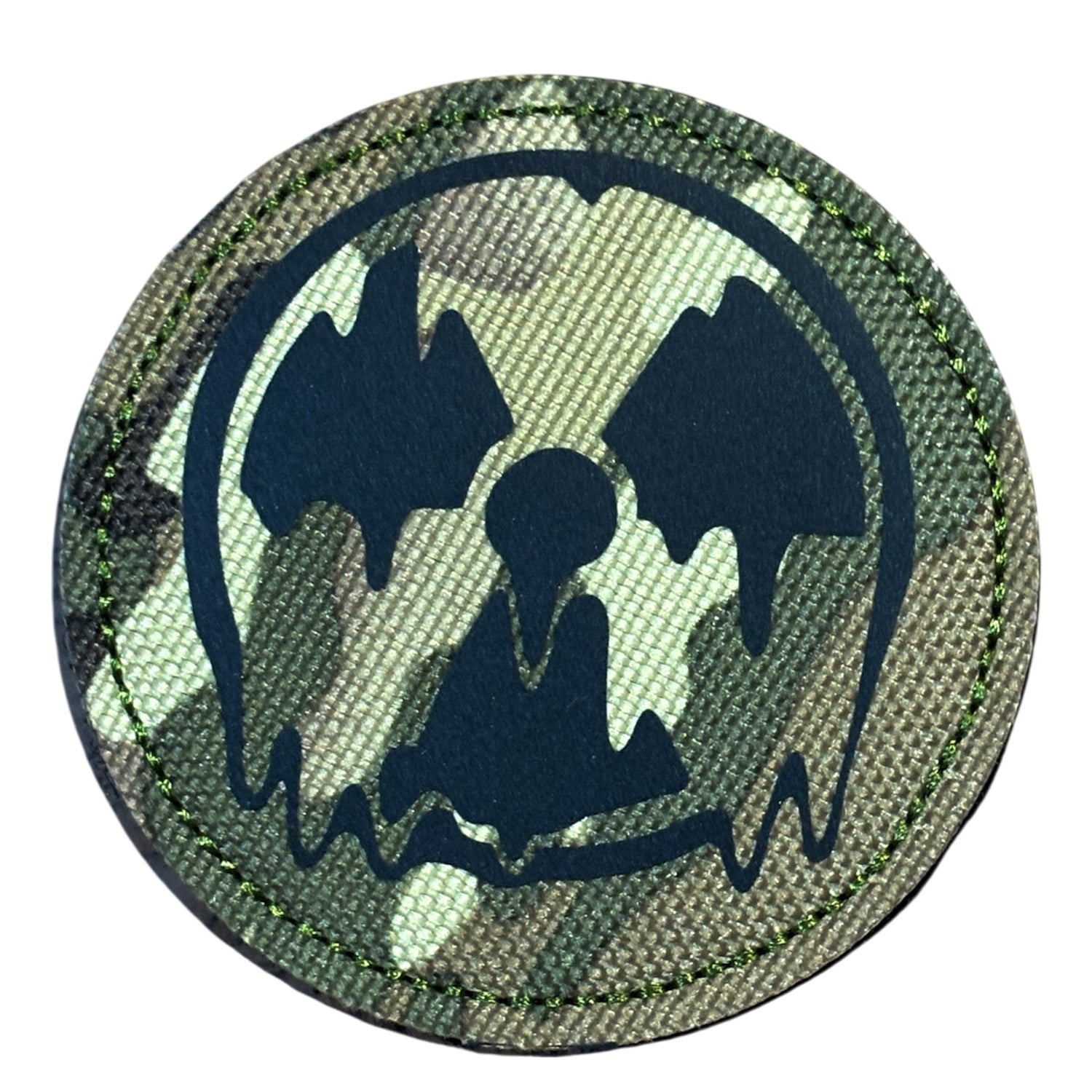 Make a bold statement with the Radioactive Meltdown Laser Cut Multicam Patch. This striking 8cm patch features laser-cut precision detailing that demands attention. Backed with both hook and loop fasteners, it's ready to attach to tactical gear, backpacks, or uniforms instantly.  www.defenceqstore.com.au