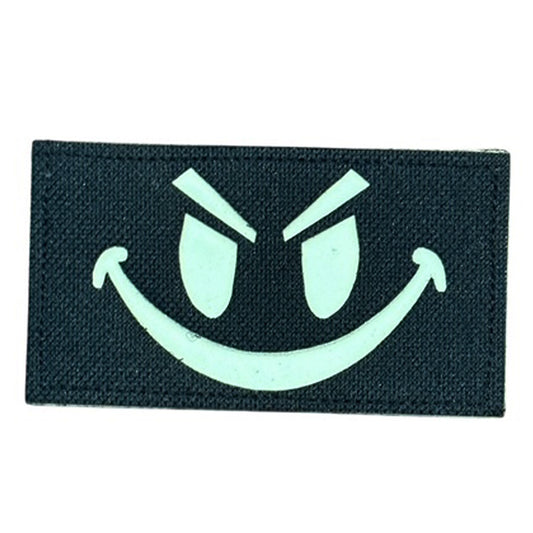 Make a bold statement with the Evil Smile 9x5cm Laser Cut Black Patch Hook &amp; Loop . This striking 9x5cm patch features laser-cut precision detailing that demands attention. Backed with both hook and loop fasteners, it's ready to attach to tactical gear, backpacks, or uniforms instantly. www.defenceqstore.com.au