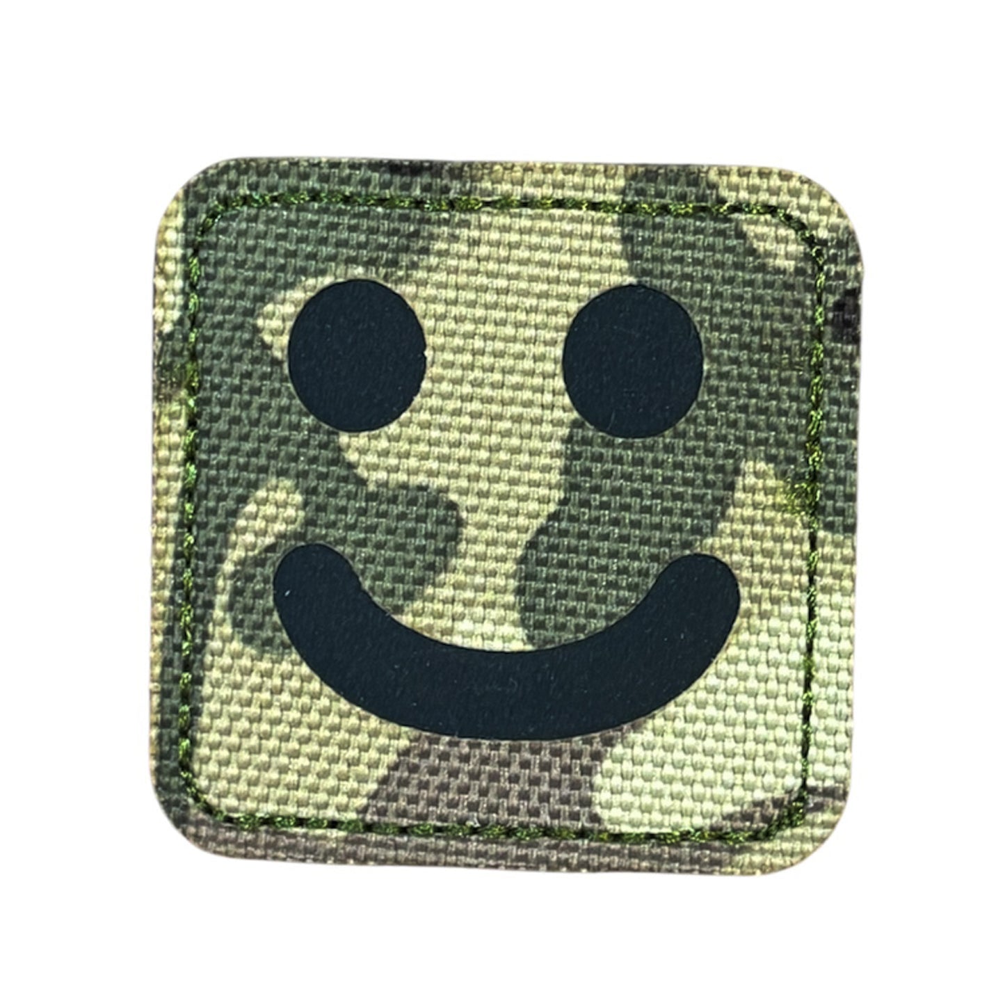 Make a bold statement with the Smiley Laser Cut Multicam Patch. This striking 5x5cm patch features laser-cut precision detailing that demands attention. Backed with both hook and loop fasteners, it's ready to attach to tactical gear, backpacks, or uniforms instantly.  www.defenceqstore.com.au