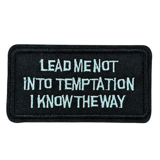Unleash your creativity with the Lead Me Not Into Temptation Embroidery Patch Velcro Backed! Measuring 8.7x4.7cm and featuring a beautifully embroidered design and secure hook &amp; loop backing, this patch is a must-have for any collector. www.defenceqstore.com.au