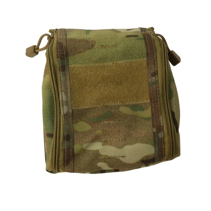 The VALHALLA IFAK Pouch lets you keep an IFALK or medical essentials within an arm's reach. Specifically designed to attach to any MOLLE web platform, the pouch features a drop-down zippered compartment with a light-coloured interior for easy equipment identification and bungee tie-downs for added stability.