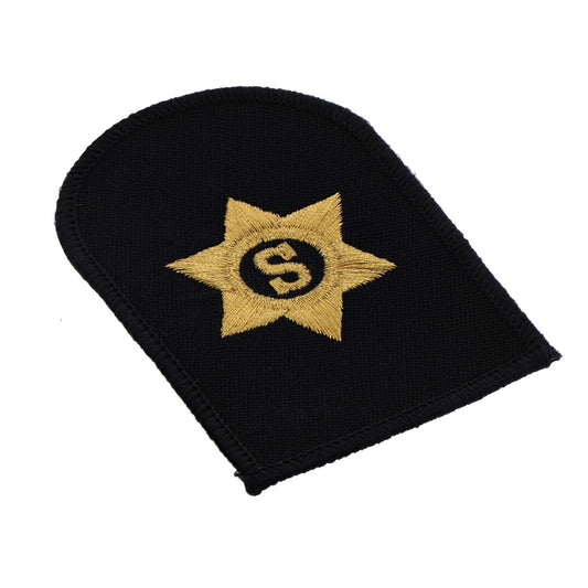 Perfectly sized, this Stores Badge has embroidered details ready for wear  Specifications:      Material: Embroidered details     Colour: Black, gold     Size: Standard